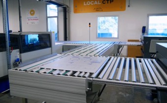 Transportförderer für belichtete Platten